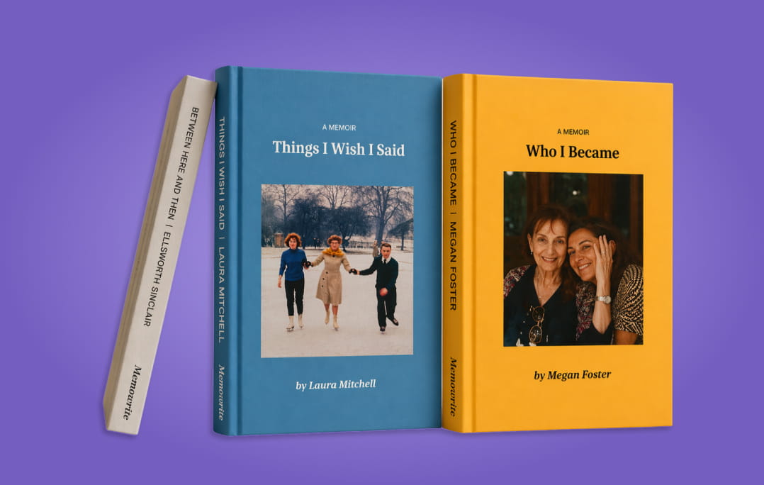 Three printed Memowrite memoirs, including Things I Wish I Said and Who I Became, standing on a violet background
